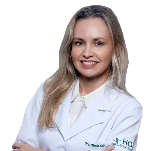 Dra. Sheila Maria Mandalis Swerts olhando para frente